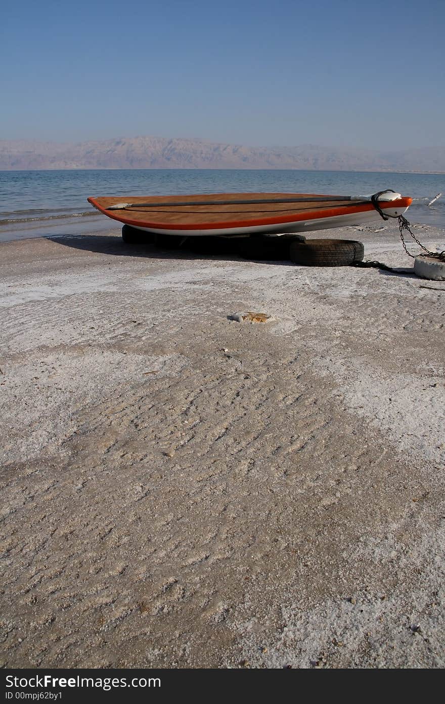 Boat on the shore of the Dead Sea