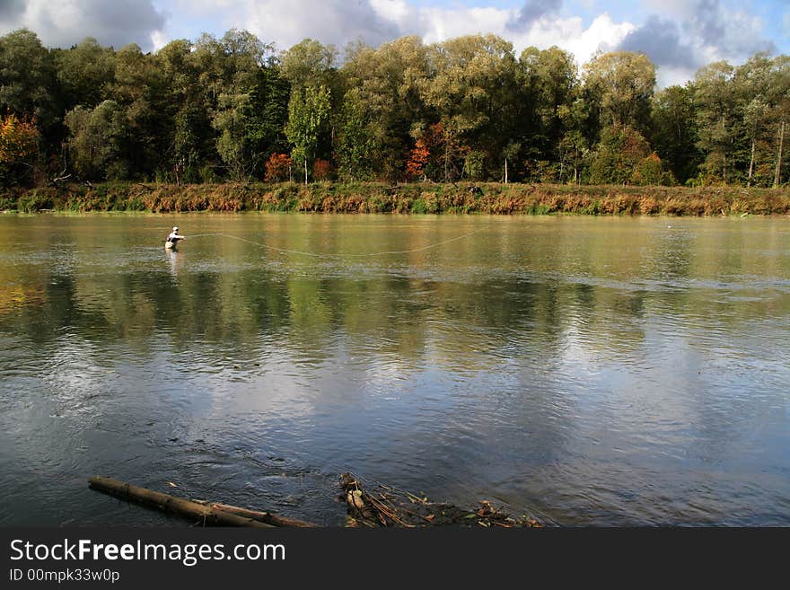 Fly fishing in autumn river. Fly fishing in autumn river