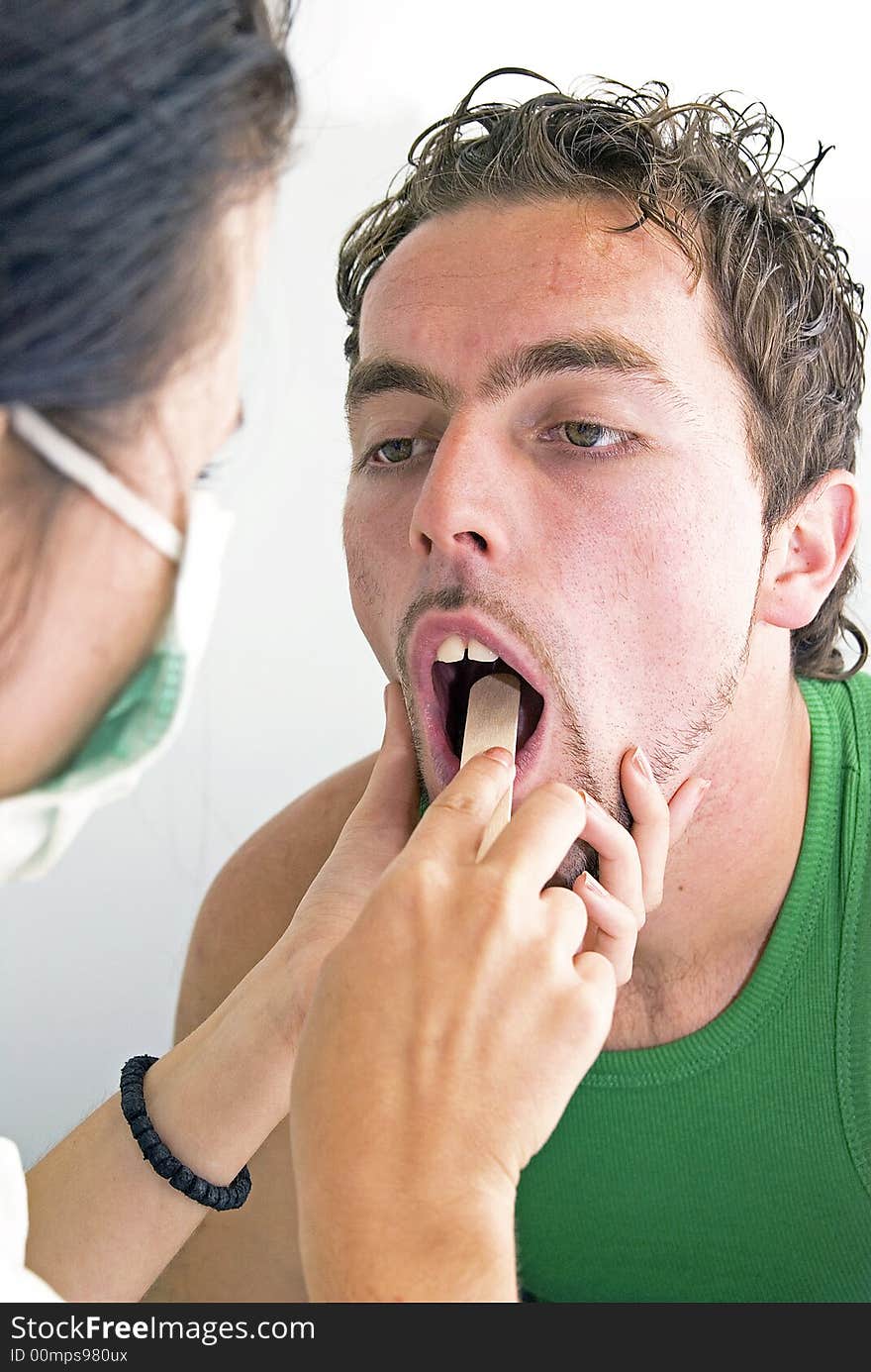 Checking throat an hospital room