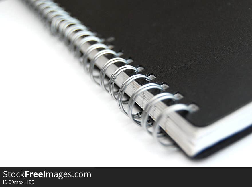 Close up of binder with white lined pages