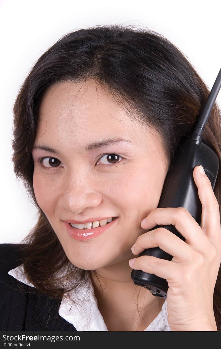 Business girl on the phone over a white background