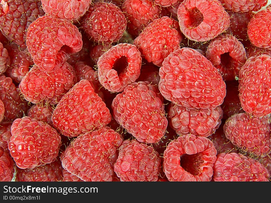 Raspberries close up, background and texture. Raspberries close up, background and texture