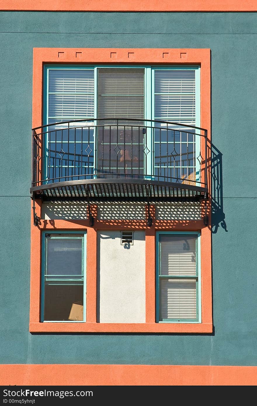 Architectural details of modern building with window and balcony