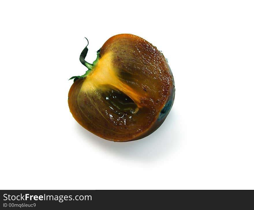 The cut persimmon on a white background.