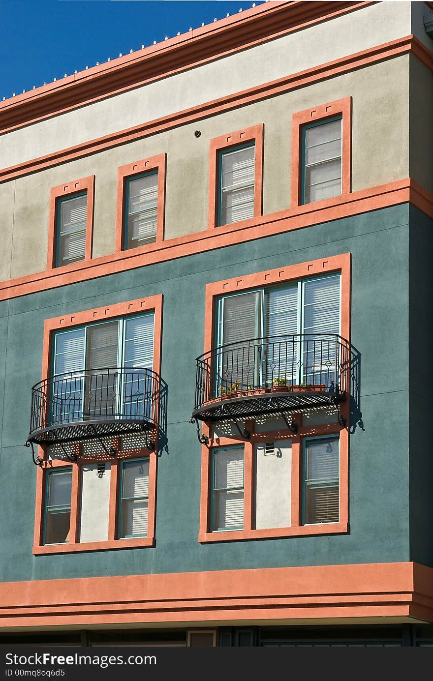 Architectural details of modern building with windows and balconies