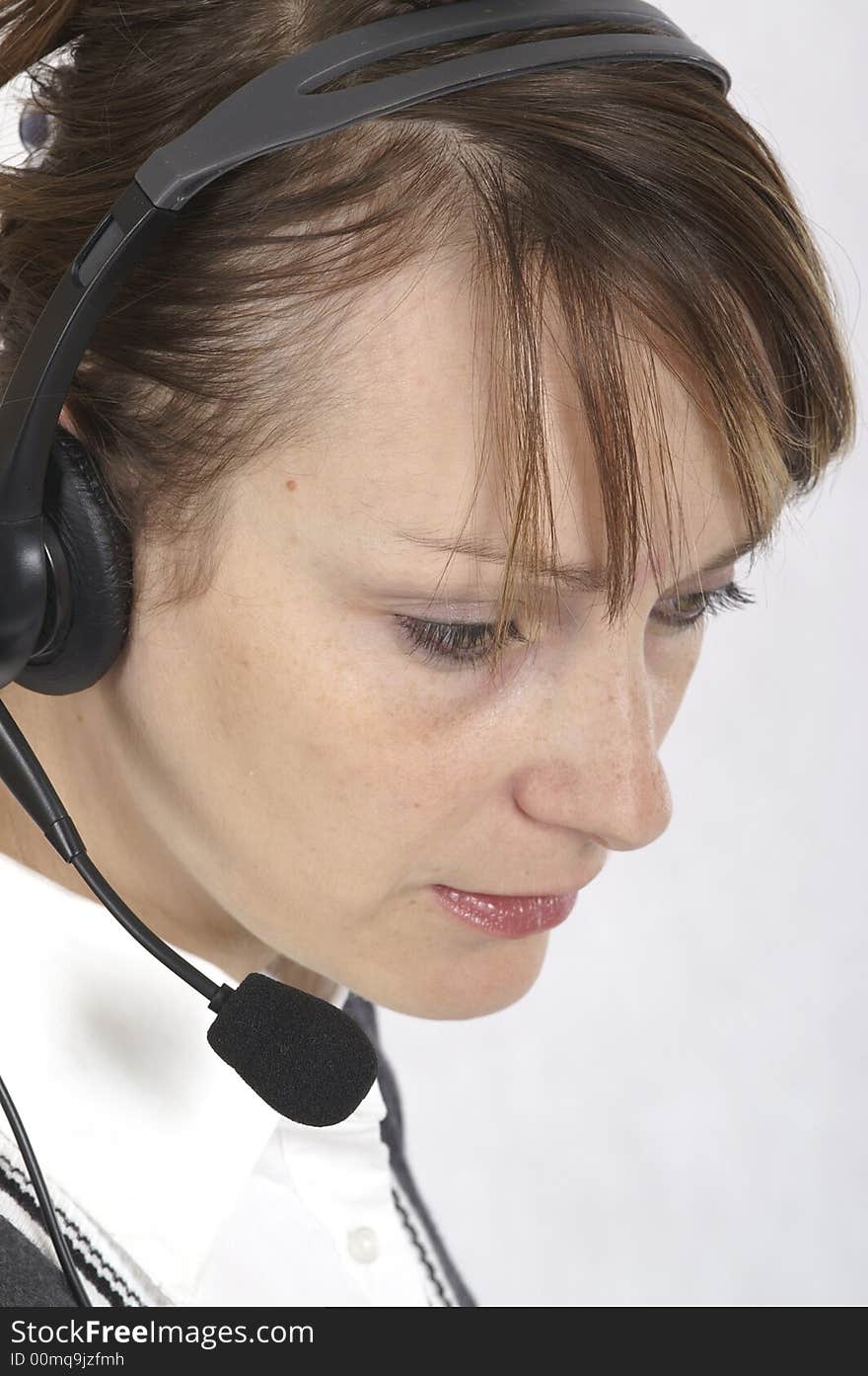 Customer service agent with headphones on head