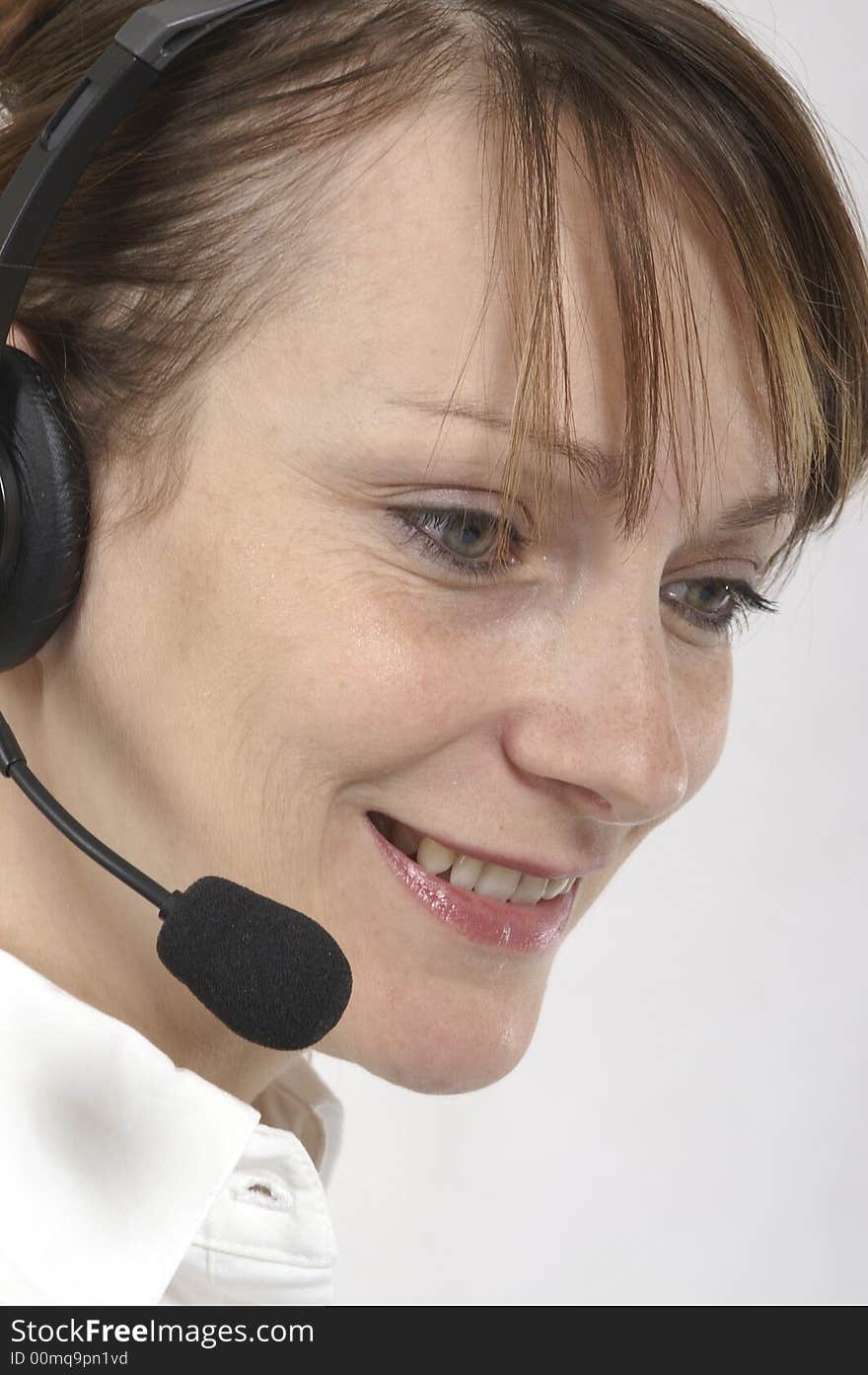 Customer service agent with headphones on head