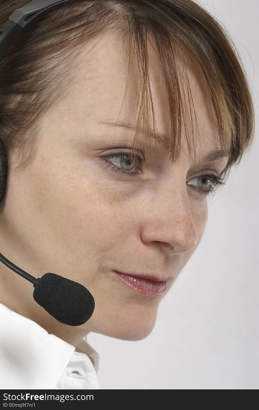 Customer service agent with headphones on head