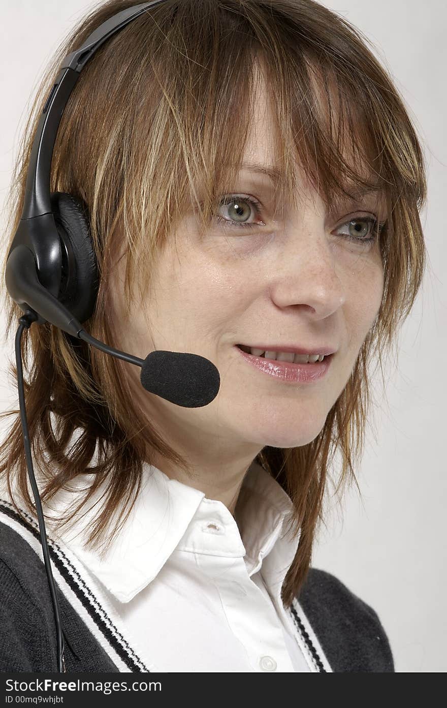 Customer service agent with headphones on head