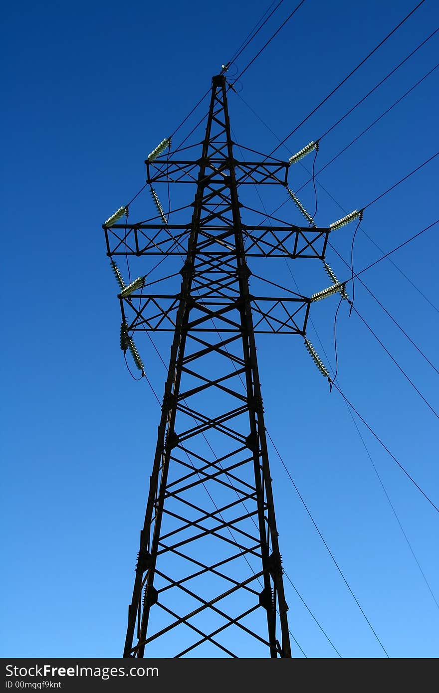 Big Power Line tower isolated on blue sky. Big Power Line tower isolated on blue sky