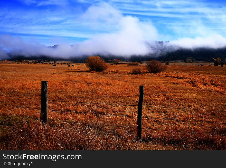 Low clouds hang of Long Valley on fall morning, Idaho. Low clouds hang of Long Valley on fall morning, Idaho