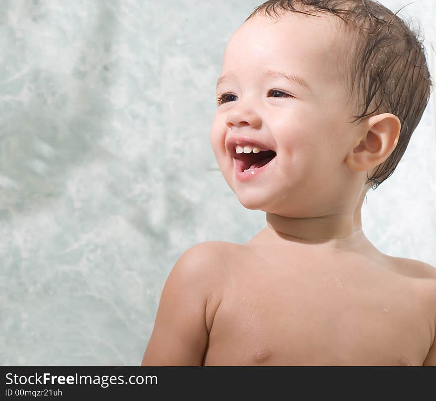 Happy Child is bathing with toys. Happy Child is bathing with toys