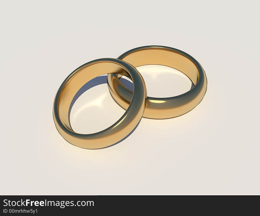 Golden wedding rings with caustic on white background