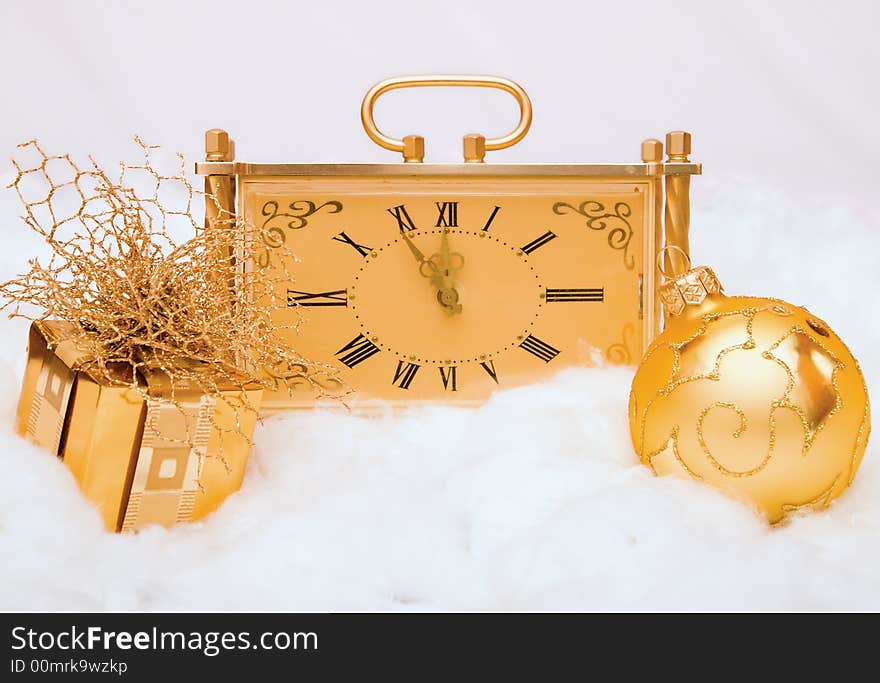 Golden clock shows five minutes till New Year. Golden clock shows five minutes till New Year