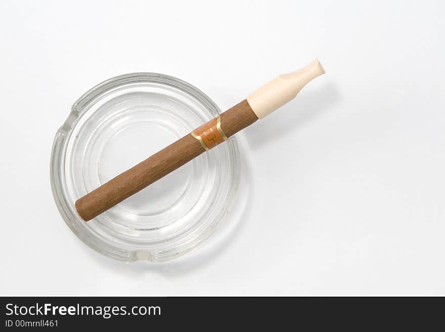 Close up of cigar and ash-tray on white background. Close up of cigar and ash-tray on white background