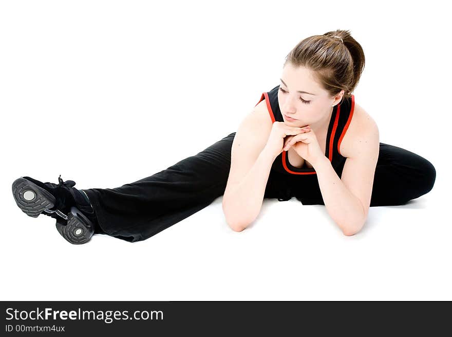 A young caucasian girl doing different stretches. A young caucasian girl doing different stretches