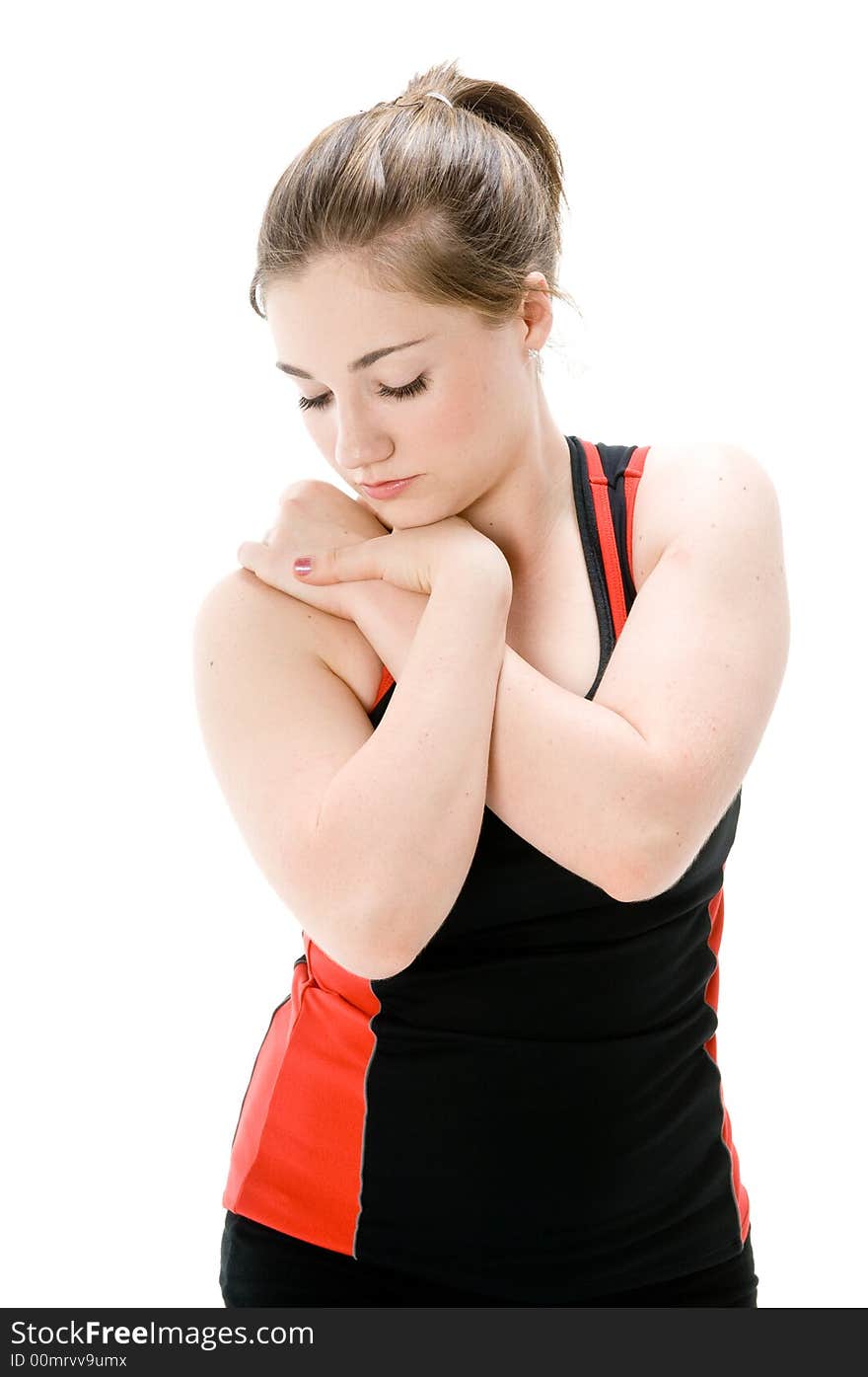 A young caucasian girl doing different stretches. A young caucasian girl doing different stretches