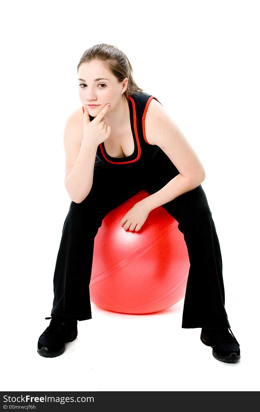 A young caucasian girl doing different stretches. A young caucasian girl doing different stretches