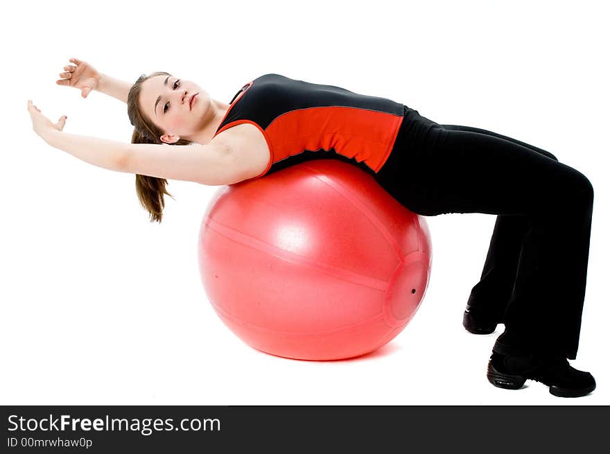 A young caucasian girl doing different stretches. A young caucasian girl doing different stretches