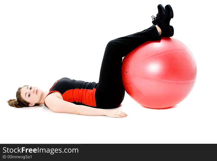 A young caucasian girl doing different stretches. A young caucasian girl doing different stretches