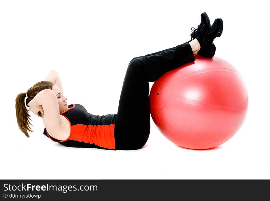 A young caucasian girl doing different stretches. A young caucasian girl doing different stretches