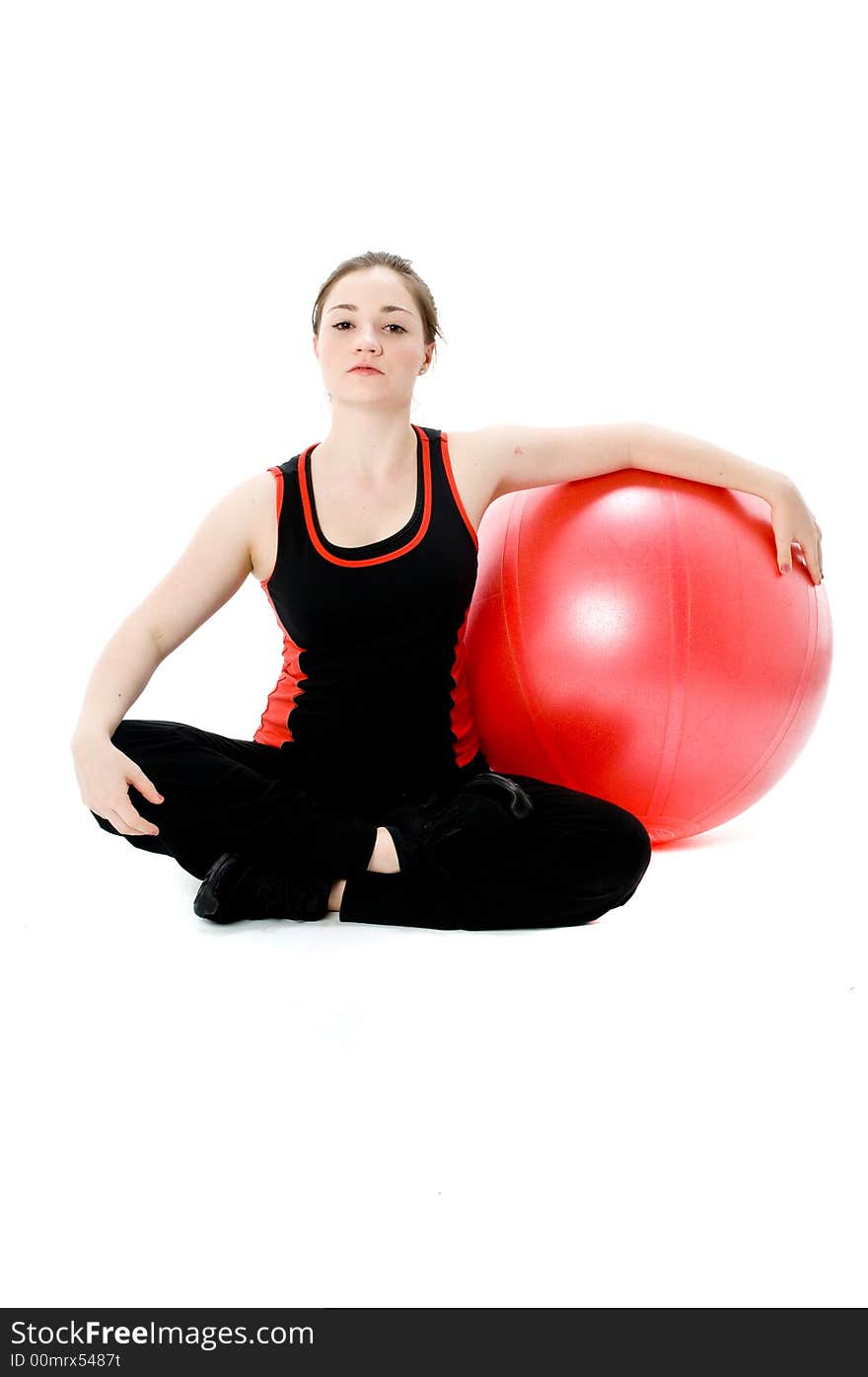 A young caucasian girl doing different stretches. A young caucasian girl doing different stretches