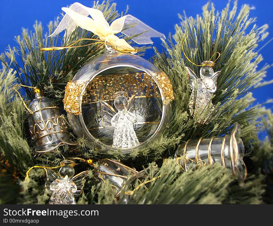 Three angels and bulbs  on Christmas tree. Three angels and bulbs  on Christmas tree