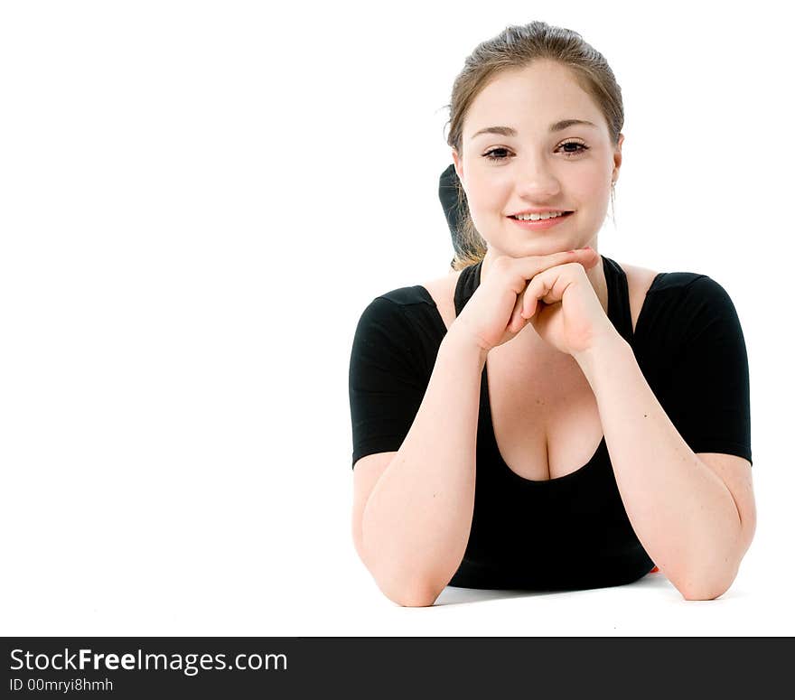 A young caucasian girl doing different stretches. A young caucasian girl doing different stretches