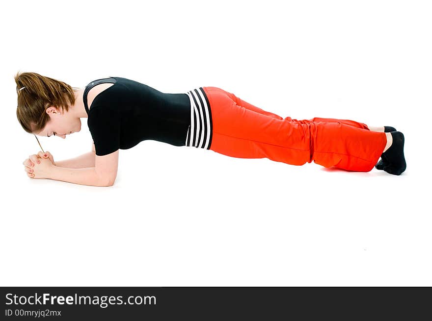 A young caucasian girl doing different stretches. A young caucasian girl doing different stretches