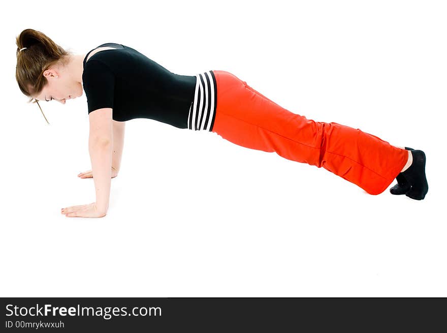 A young caucasian girl doing different stretches. A young caucasian girl doing different stretches