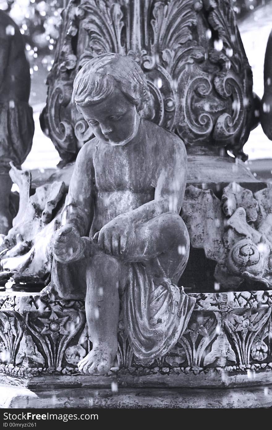 Cherub under fontain