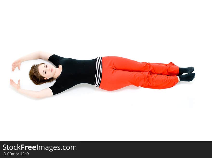 A young caucasian girl doing different stretches. A young caucasian girl doing different stretches