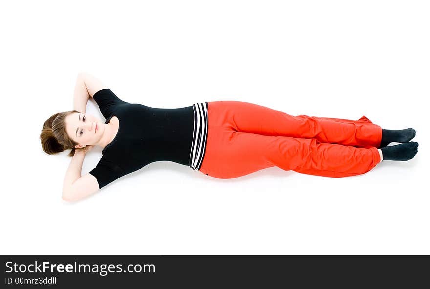 A young caucasian girl doing different stretches. A young caucasian girl doing different stretches