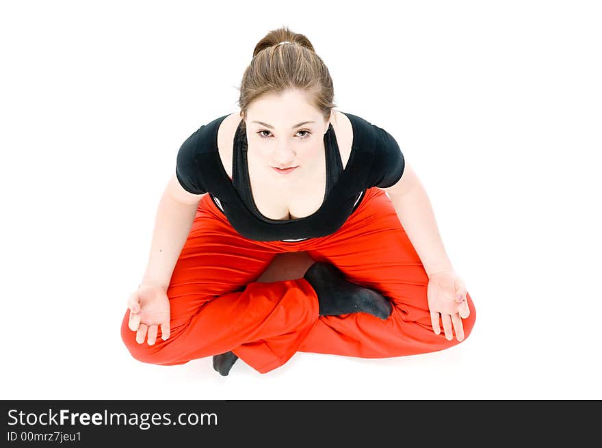 A young caucasian girl doing different stretches. A young caucasian girl doing different stretches