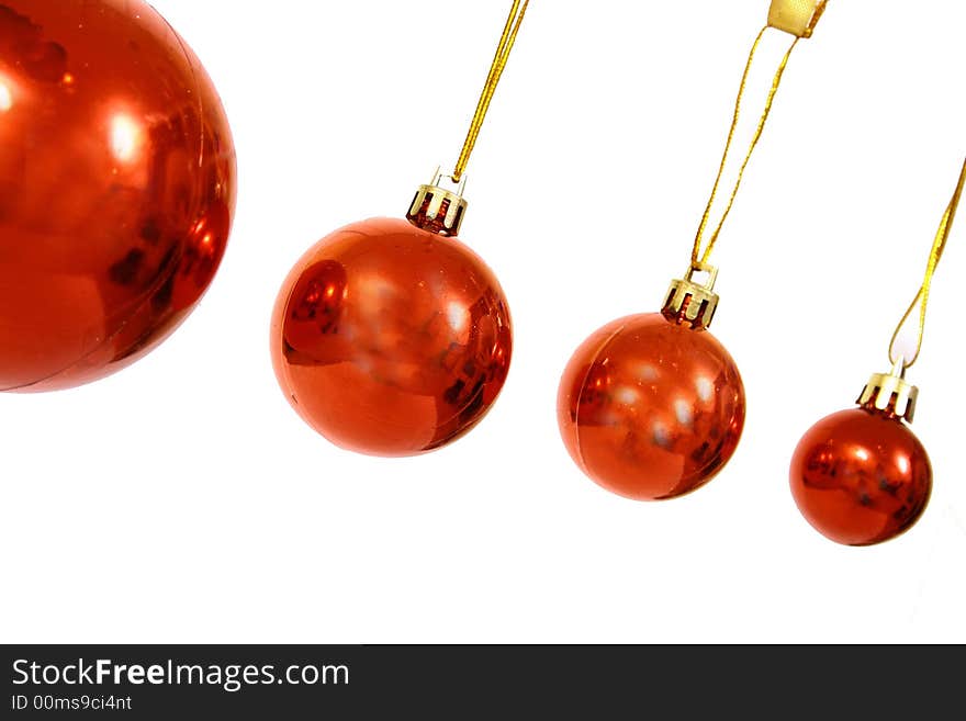 Christmas balls on a white bac