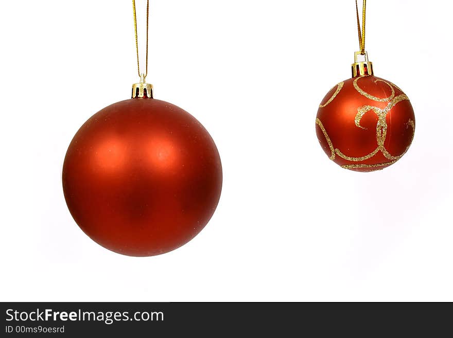 Christmas balls on a white bac