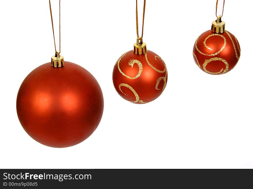 Christmas balls on a white bac