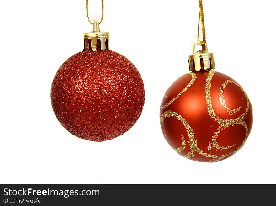 Christmas balls on a white bac