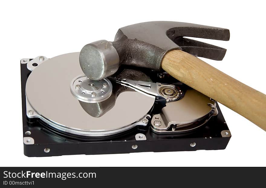 A repair for a computer hard drive. A broken disk drive. A repair for a computer hard drive. A broken disk drive.