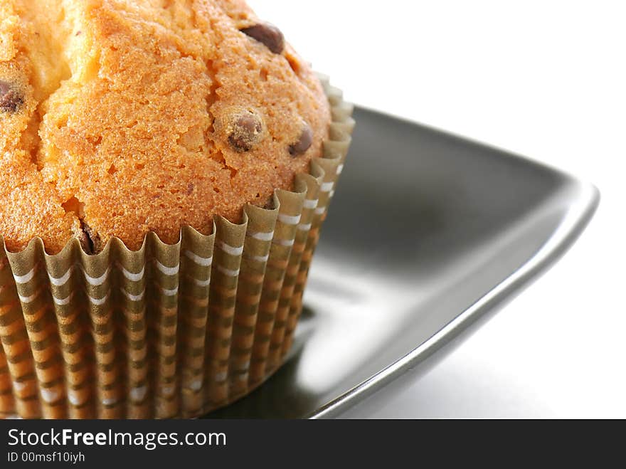 Tasty muffin on white background in closeup. Tasty muffin on white background in closeup