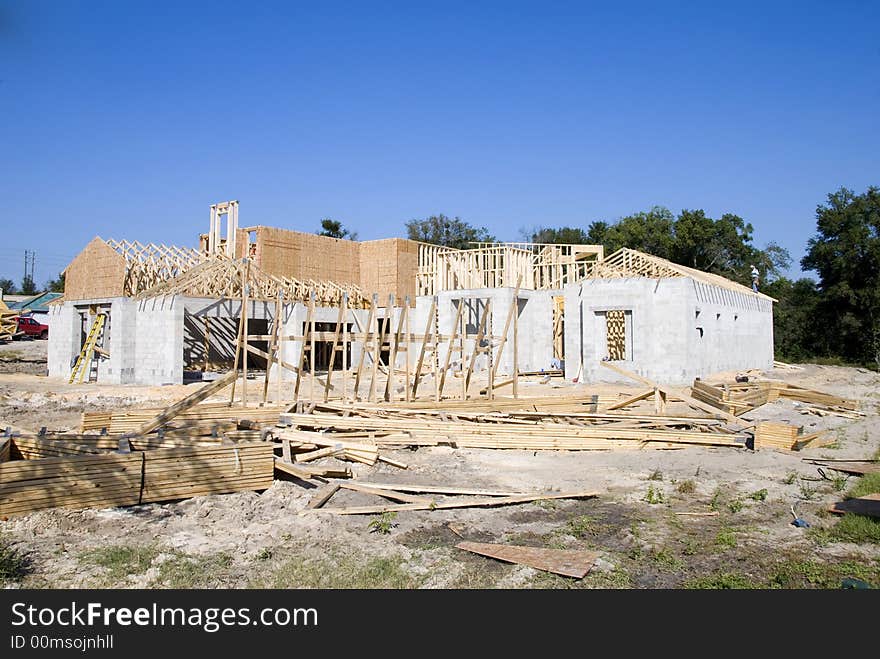 Block and frame home under construction and a clear day. Block and frame home under construction and a clear day