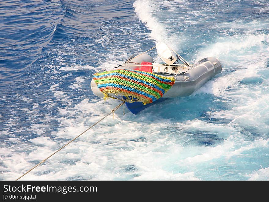 Rubber boat being towed