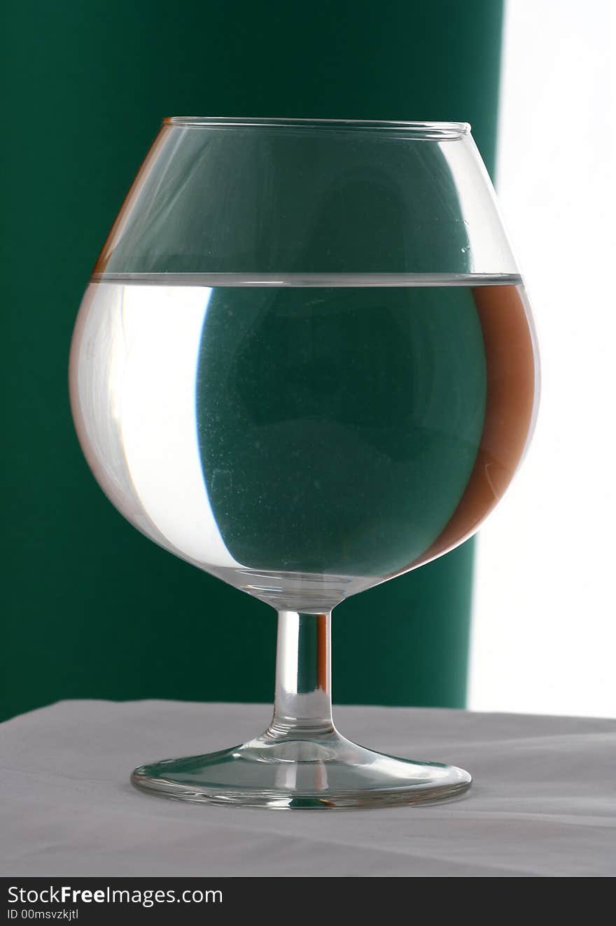 Wineglass in Green and Orange background