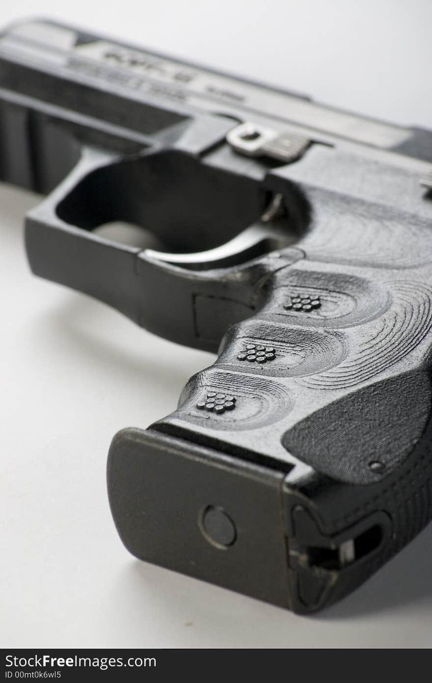 9 mm  contemporary handgun isolated on white