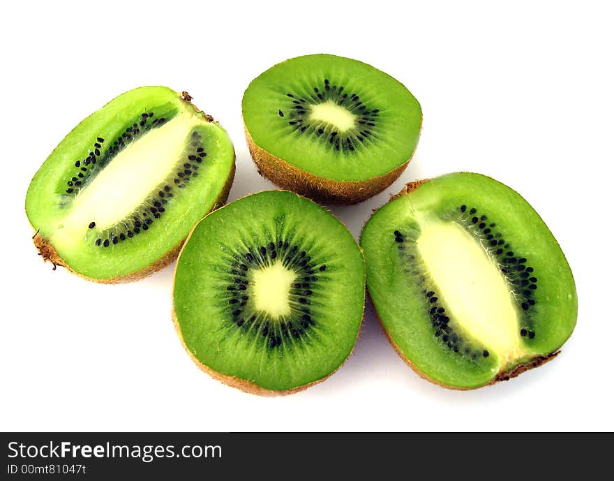 Pieces of kiwi isolated on white background