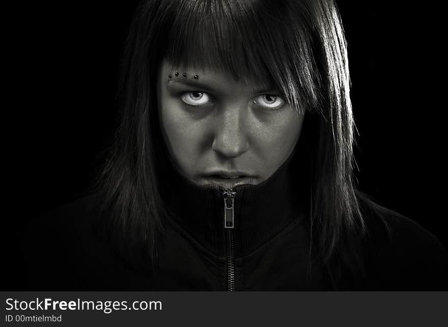 Angry girl looking straight to camera. Determined and confident. Angry girl looking straight to camera. Determined and confident.