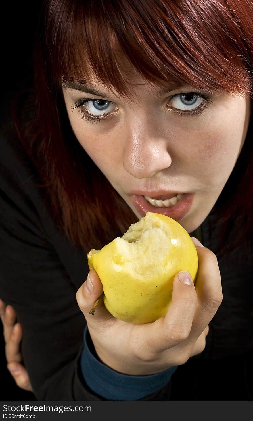 Girl biting/eating a delicious yellow apple and flirting with the viewer. Healthy lifestyle.

Studio shot. Girl biting/eating a delicious yellow apple and flirting with the viewer. Healthy lifestyle.

Studio shot.