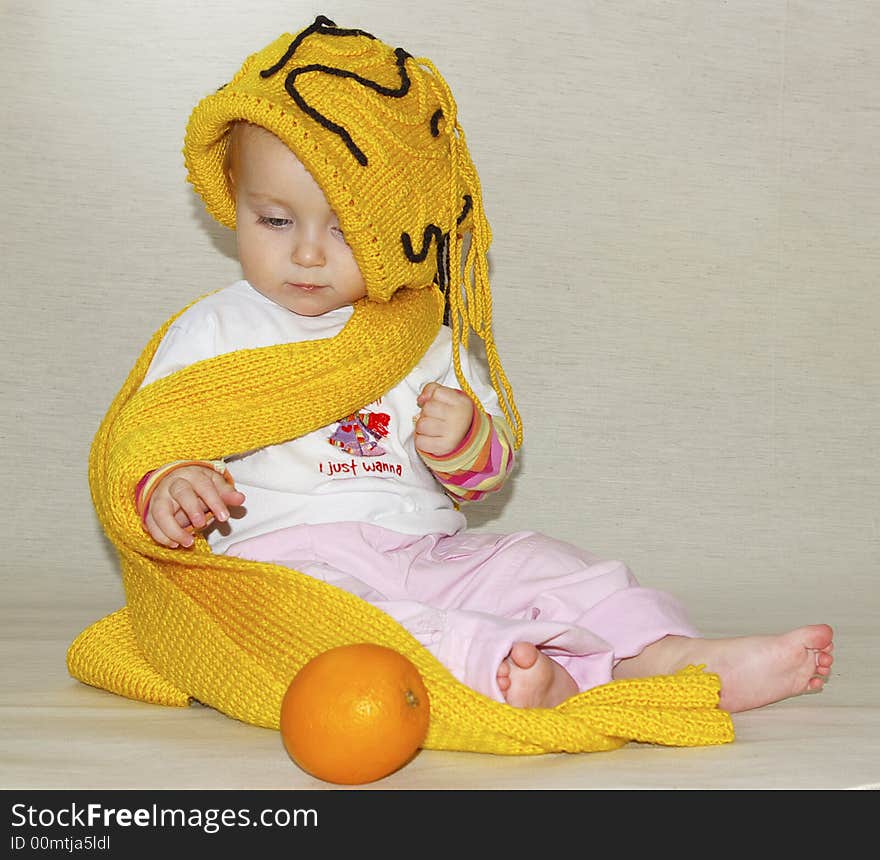 Little girl and yellow cap