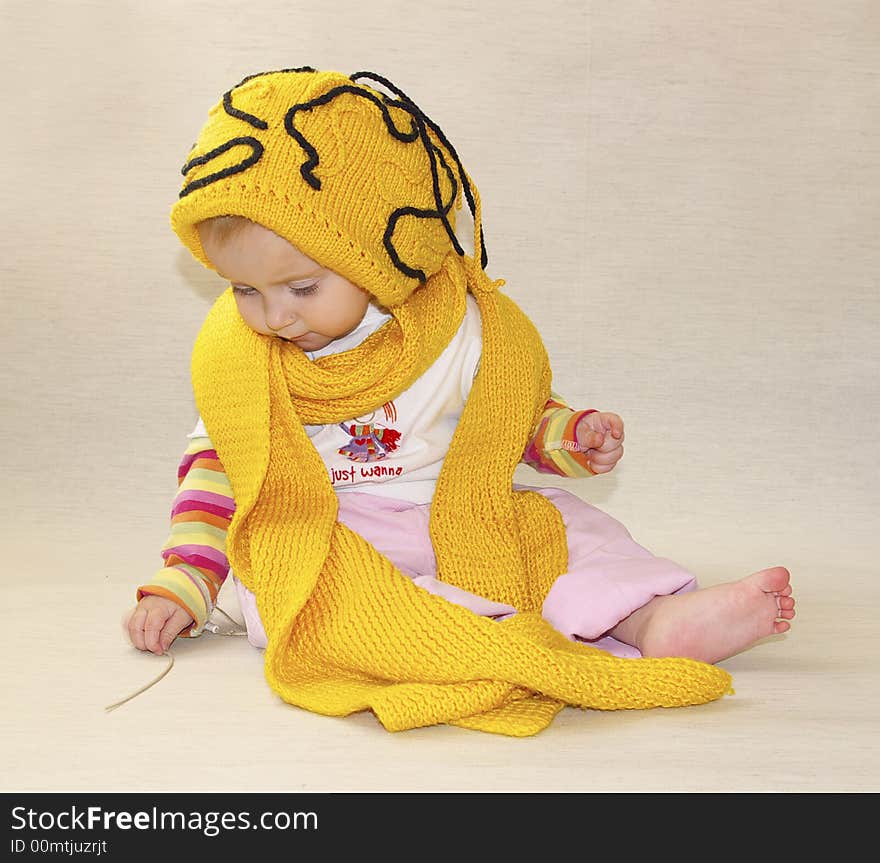 Little girl and yellow cap