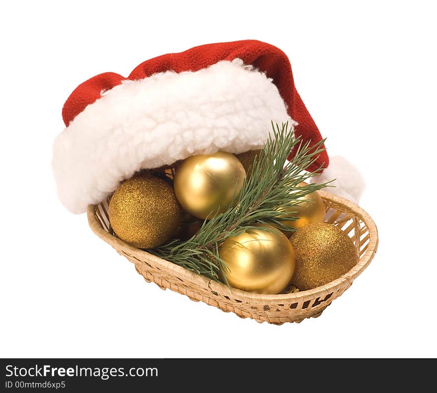 Basket with gold eggs and a cap Santa Claus. Basket with gold eggs and a cap Santa Claus